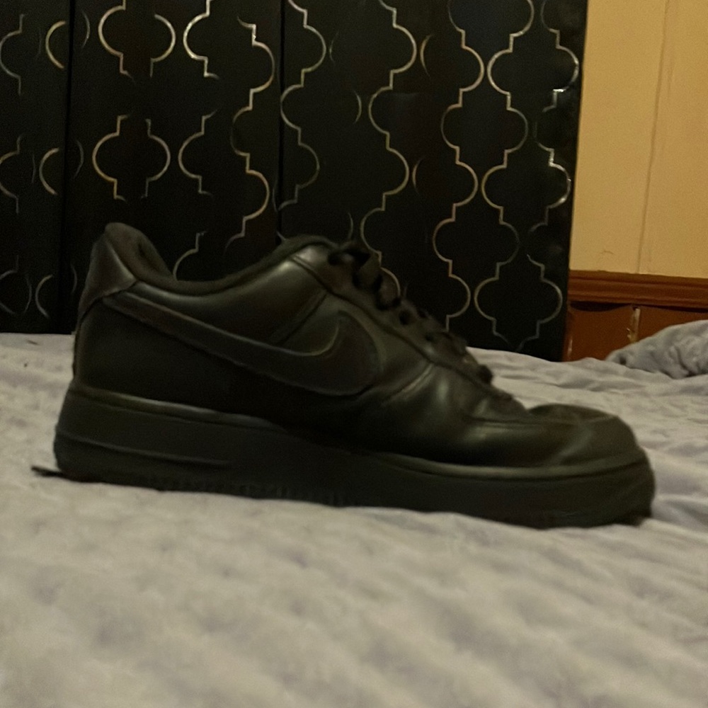 They are black Nike air force 1s